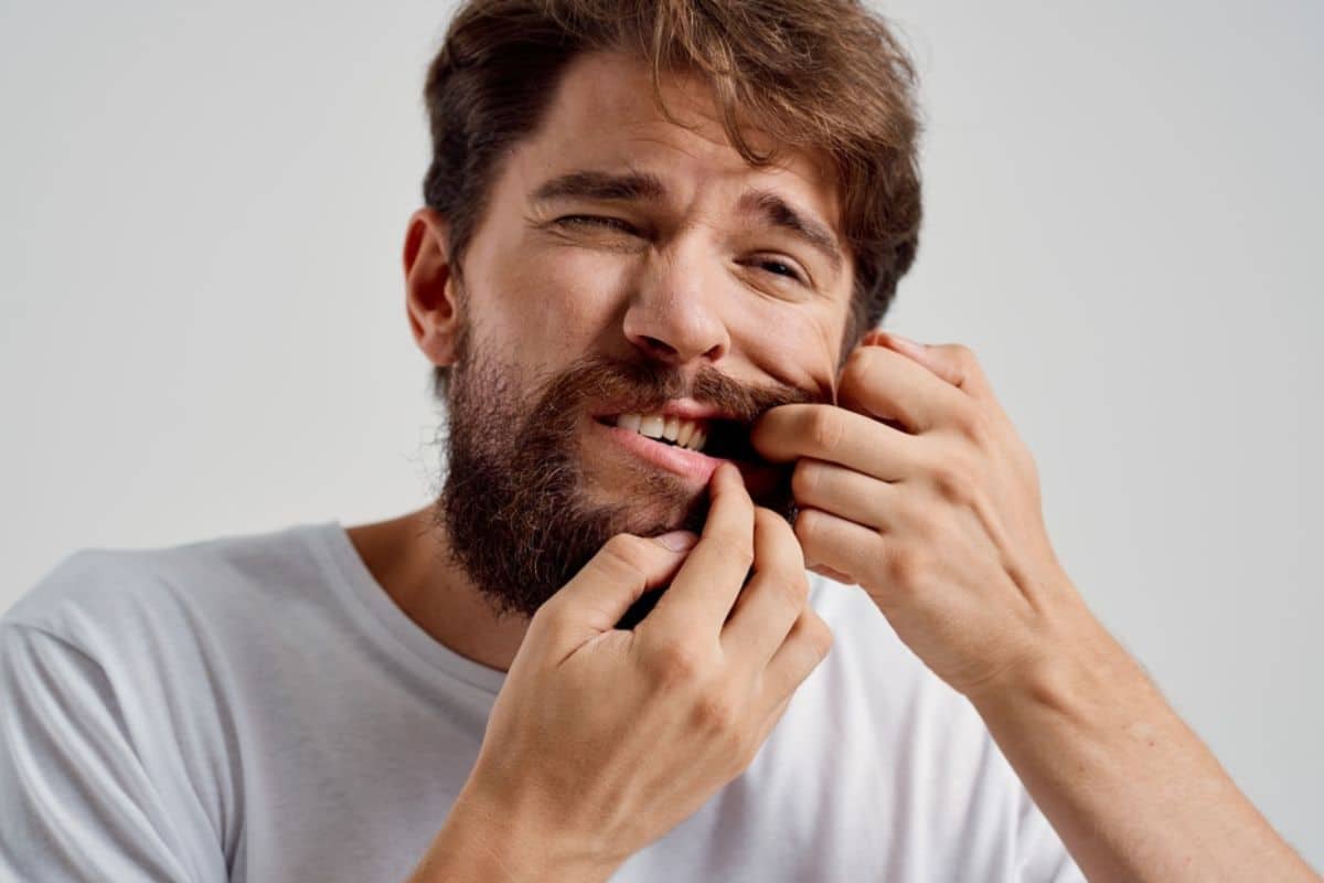 man expressing dental pain