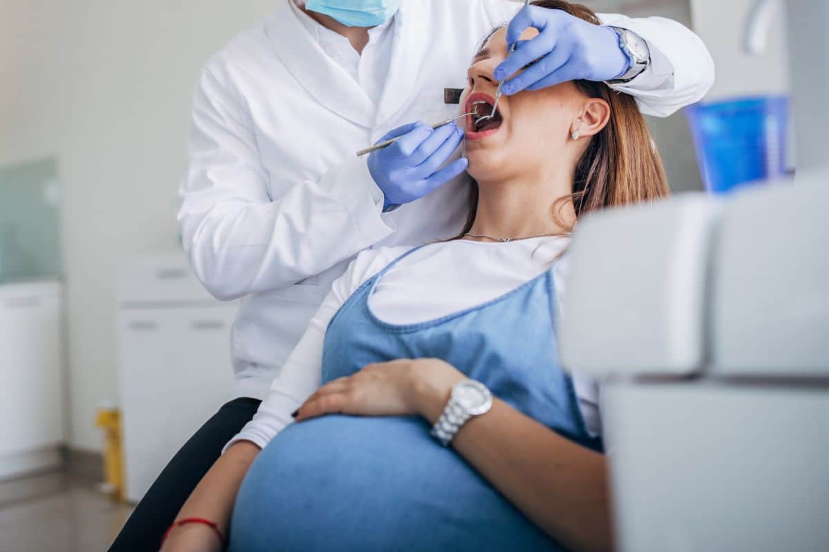 https://myspearmintdental.com/wp-content/uploads/2024/10/pregnant-woman-taking-dental-checkup.jpg