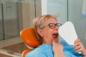 symptoms of implant failure